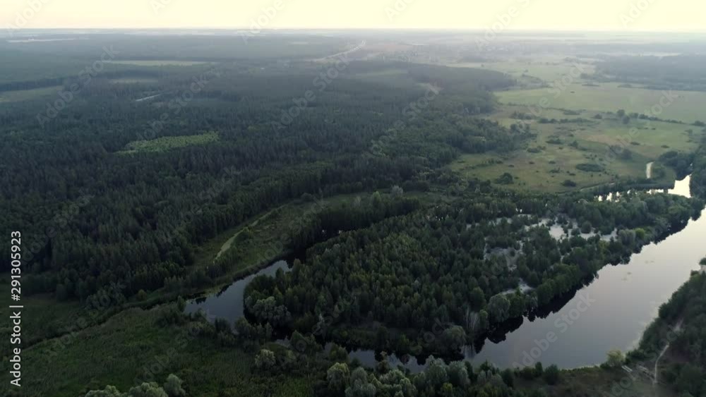 Countryside landscape aerial shot. Prosperity wealth progress. Green wild scenery. Sunrise lens flare. Countryside landscape aerial shot. Prosperity wealth progress. Green wild scenery. Sunrise lens flare.