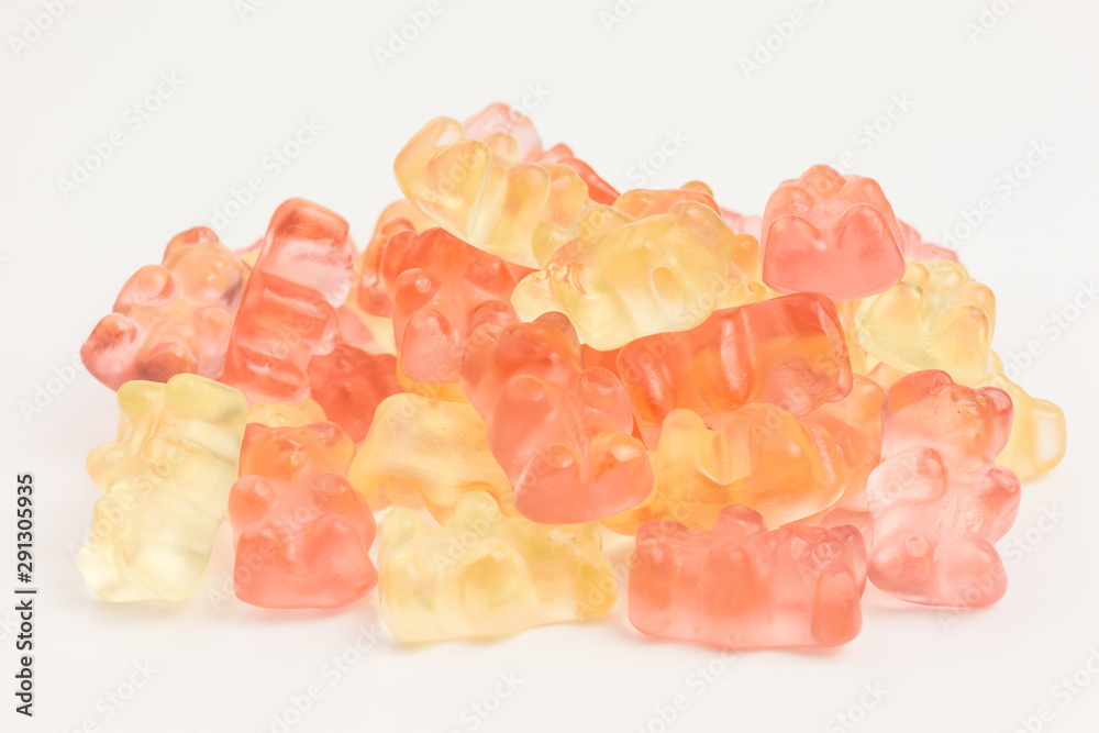 heap of pink and white gummy bears