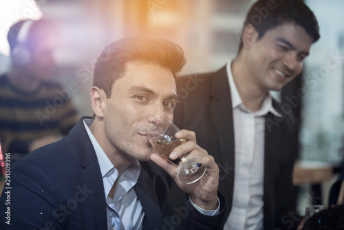 man with glass of wine