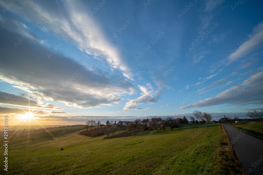 Sunrise in spring field at early morning Sunrise in spring field at early morning
