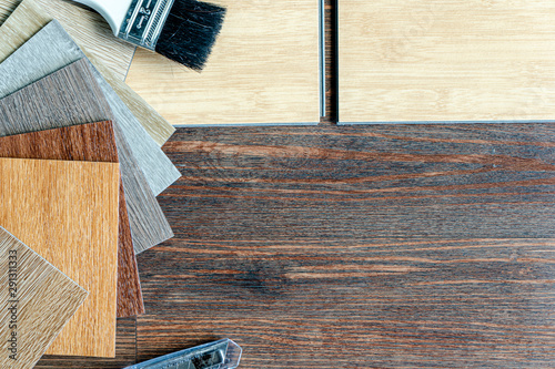 flat lay on wood pattern design space for vinyl floor tiles marketing 