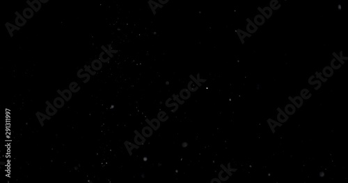 Shattered and broken glass shards flying through the air after crush broken window on a black background