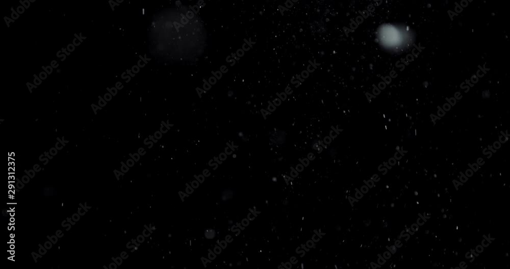 Shattered and broken glass shards flying through the air after crush broken window on a black background