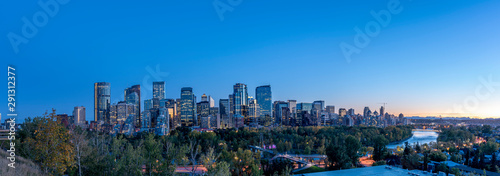 Skyline panoramic of Calgary, Alberta at sunset.