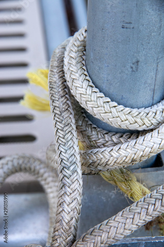 Rope knots tied to dock, closeup