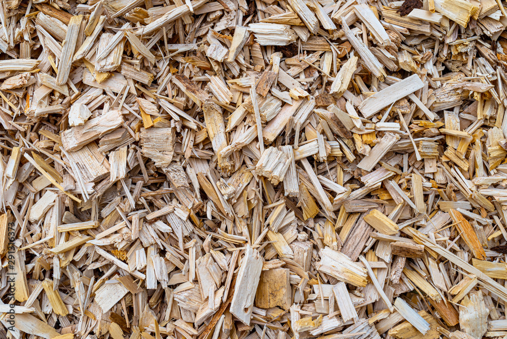 Background made of wood chips, closeup shot, wooden texture. Background made of wood chips, closeup shot, wooden texture.