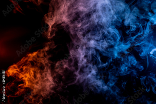 Whispy Red Purple and Blue Smoke on Black Background
