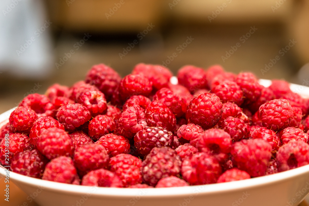 raspberries in a bowl raspberries in a bowl