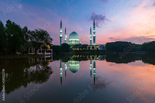 Majestice view of Sultan Salahuddin Abdul Aziz Shah mosque in the morning by the lakeside at Shah Alam, Selangor. © Mohamad Zaki