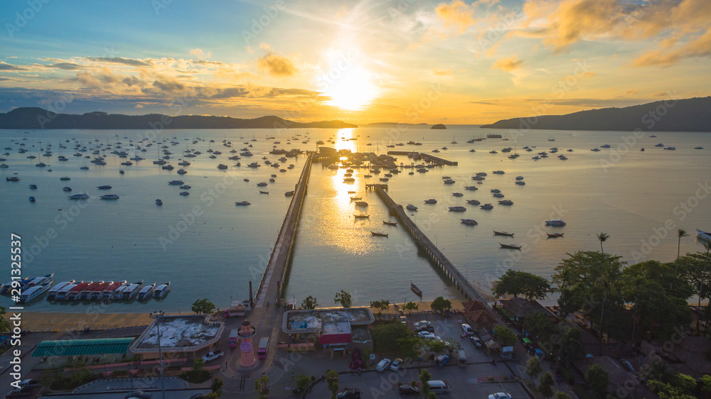 Fototapeta premium aerial photography at Chalong pier. Chalong bay is the most important marina of Phuket there have 2 piers and customs at pier.. Chalong pier transport tourist to travel around islands in Andaman sea