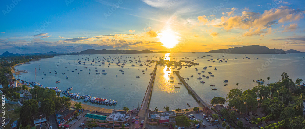 Obraz premium aerial photography at Chalong pier. Chalong bay is the most important marina of Phuket there have 2 piers and customs at pier.. Chalong pier transport tourist to travel around islands in Andaman sea