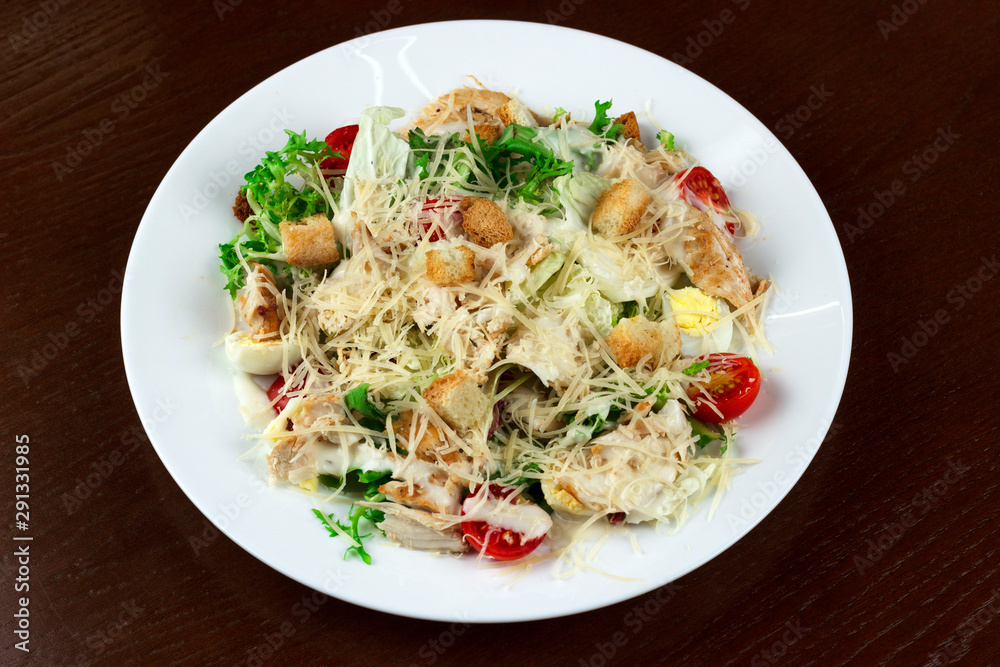 vegetable salad with cheese and chicken in a plate vegetable salad with cheese and chicken in a plate