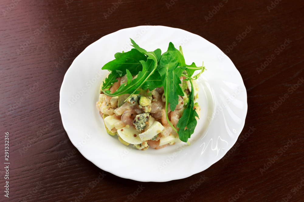 shrimp salad with egg and vegetables in a plate shrimp salad with egg and vegetables in a plate