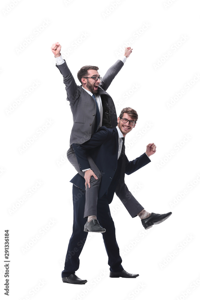 smiling businessman sitting on the back of his colleague smiling businessman sitting on the back of his colleague