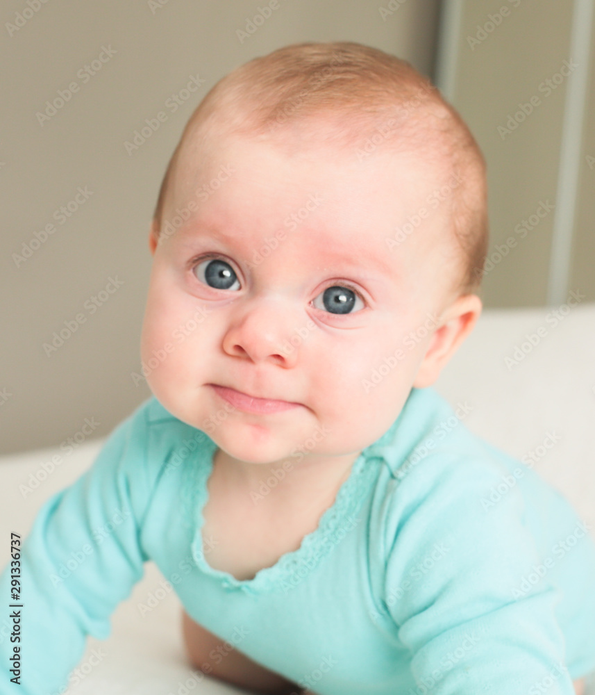 Close up portrait of 6 Month Old Cute Baby Girl, Infant with big blue eyes, New family concept, The most Beautiful Baby Princesse, Happy Baby Girl Close up portrait of 6 Month Old Cute Baby Girl, Infant with big blue eyes, New family concept, The most Beautiful Baby Princesse, Happy Baby Girl