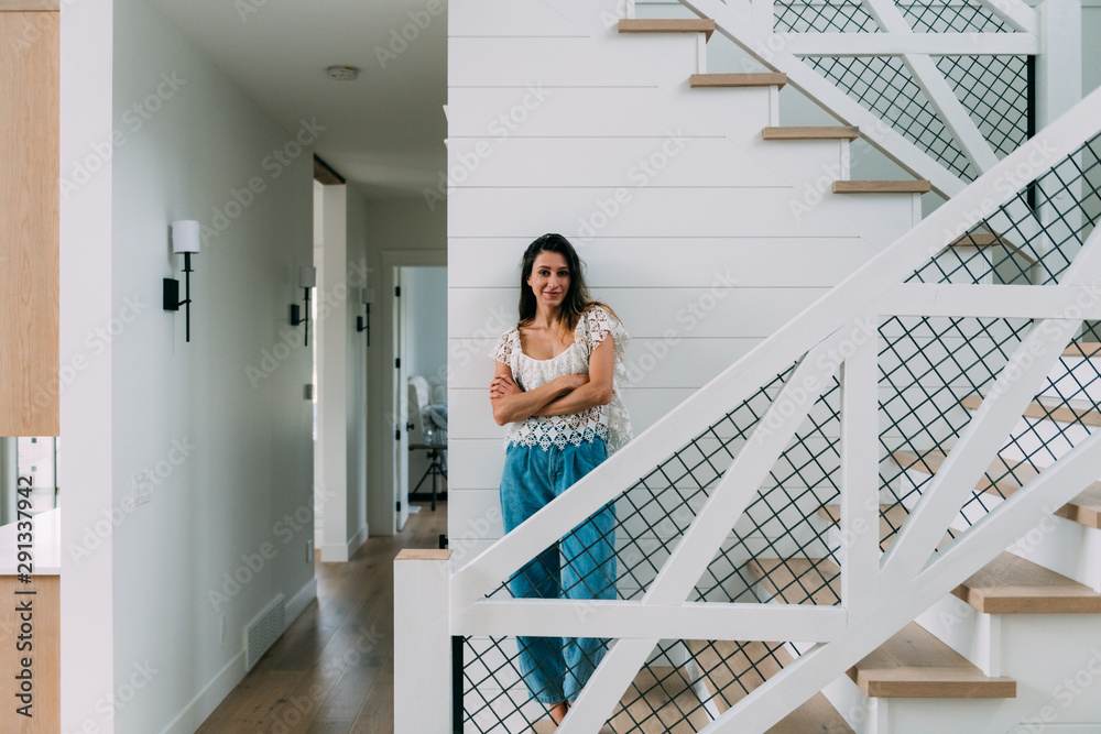 Portrait of a relaxed country girl hanging out at her brightly lit North American suburban home Portrait of a relaxed country girl hanging out at her brightly lit North American suburban home