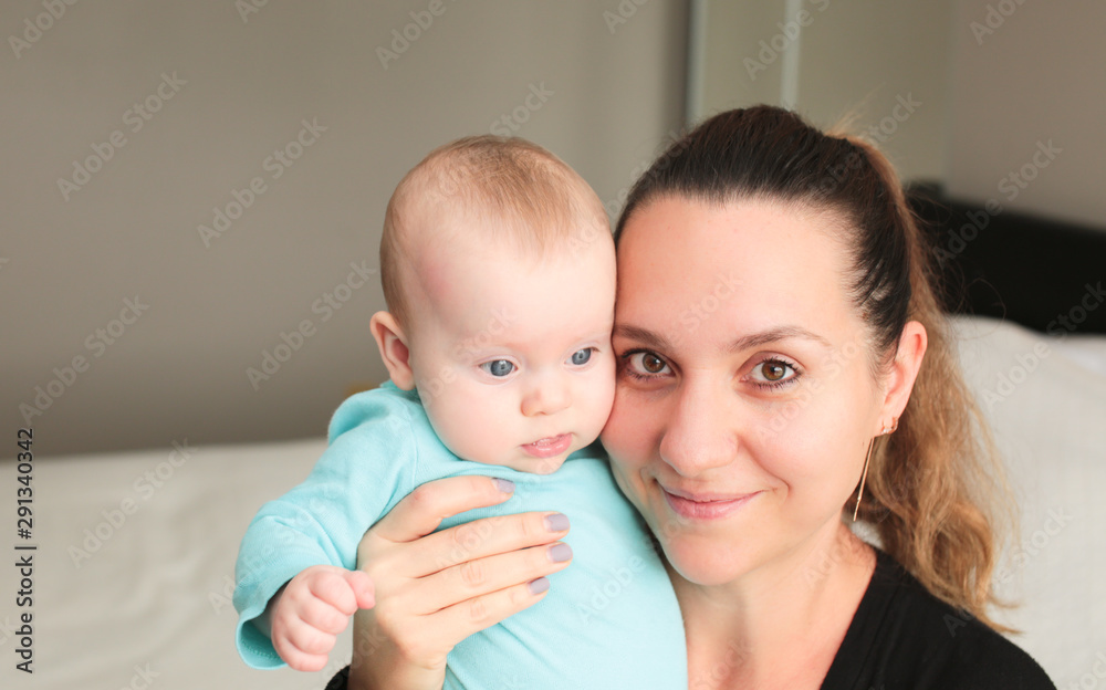 Close up portrait of Young Beautiful Mother with daughter, Cute 6 Month Old Baby Girl , Happy Family, Happy Mother’s Day, Best Mother Concept, The Most Beautiful Girls in the wo Close up portrait of Young Beautiful Mother with daughter, Cute 6 Month Old Baby Girl , Happy Family, Happy Mother’s Day, Best Mother Concept, The Most Beautiful Girls in the wo