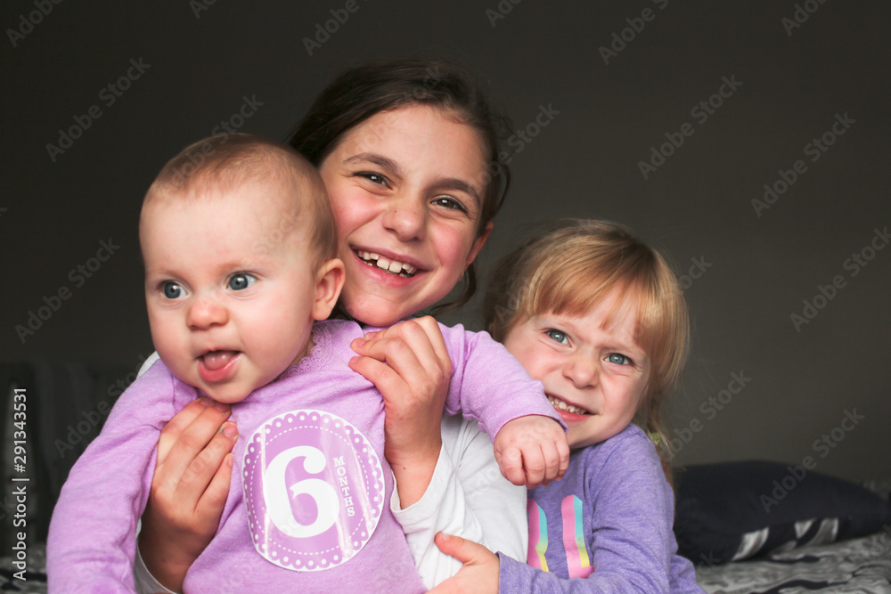 Close up Portrait of Three Beautiful Sisters, One Cute Toddler Girl , 6 Month Old Baby Girl, 7 Years Old Girl, Best Friends Forever, Happy family concept, The most Beautiful Girls, Princesses Close up Portrait of Three Beautiful Sisters, One Cute Toddler Girl , 6 Month Old Baby Girl, 7 Years Old Girl, Best Friends Forever, Happy family concept, The most Beautiful Girls, Princesses