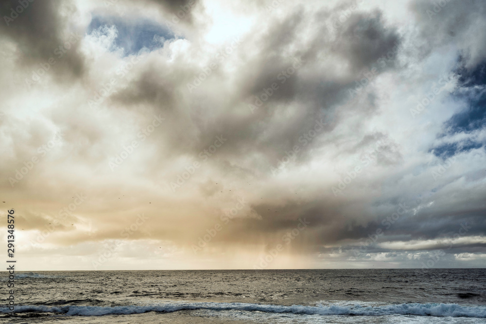 Stormy clouds above atlantic ocean.