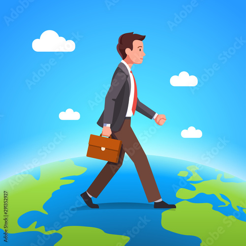 Business man walking over globe or earth planet