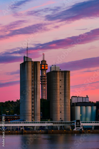 Stockholm, Sweden Frihamnen, the port of Stockholm, framed by silos at sunset. photo