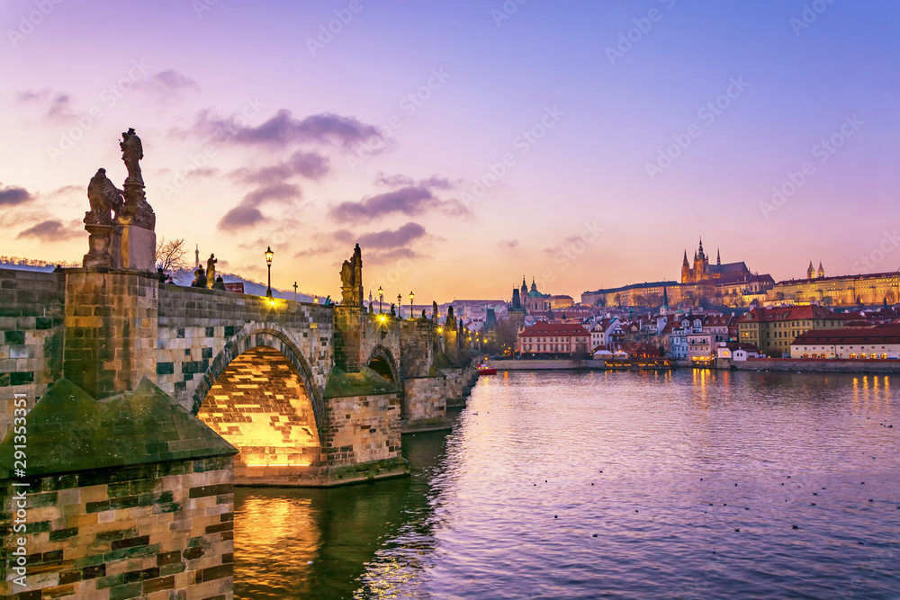 Charles bridge on Vltava river and panorama of Hradcany with Castle St. Vitus Cathedral, Prague, Czech Republic