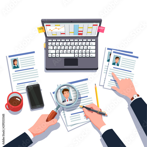 HR manager looking through business man job CV