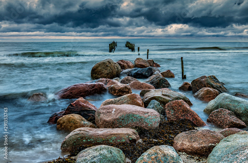 Fototapeta Naklejka Na Ścianę i Meble -  First autumnal storm at the Baltic Sea in remote coastal location, here traditional marine fisheries was successfully developed in 20-th century