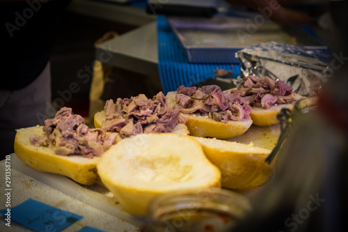 The preparation of sandwiches with lampredotto, a typical Tuscan street food