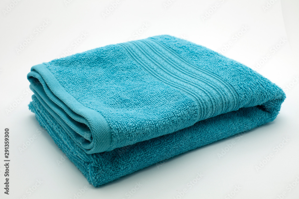 Multi-colored towels, on a white background Multi-colored towels, on a white background