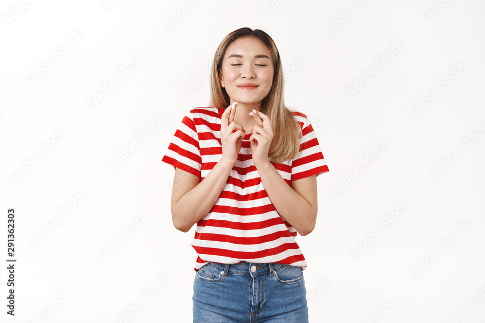Promise behave well just fulfill my dreams. Dreamy cute optimistic asian blond girl 20s close eyes smiling delighted make wish cross fingers good luck anticipating only positive news Promise behave well just fulfill my dreams. Dreamy cute optimistic asian blond girl 20s close eyes smiling delighted make wish cross fingers good luck anticipating only positive news