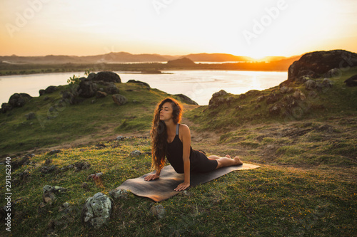 Woman training outdoors on ...