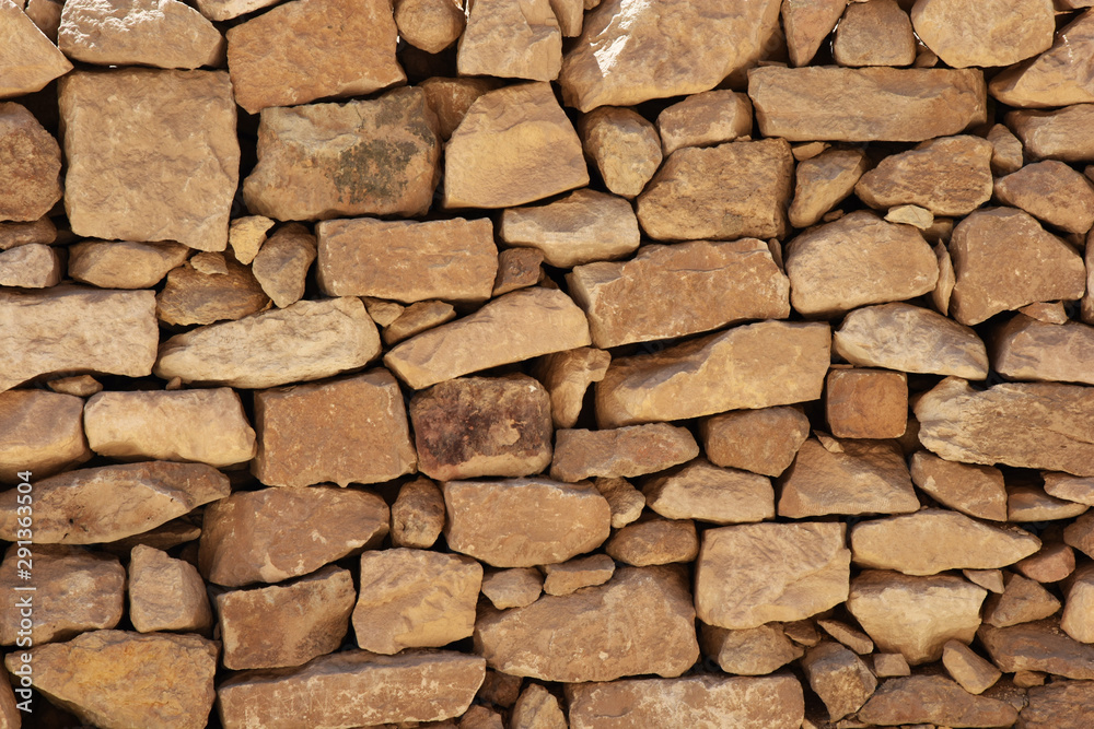 Stone wall made with rocks without concrete. Stone wall made with rocks without concrete.