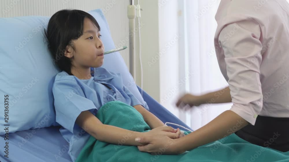 Asian doctor visit patient little girl and suggest physical examination at hospital. Concept of family, medical, healthcare and technology. Asian doctor visit patient little girl and suggest physical examination at hospital. Concept of family, medical, healthcare and technology.