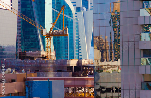 Photography construction crane and modern buildings in the city