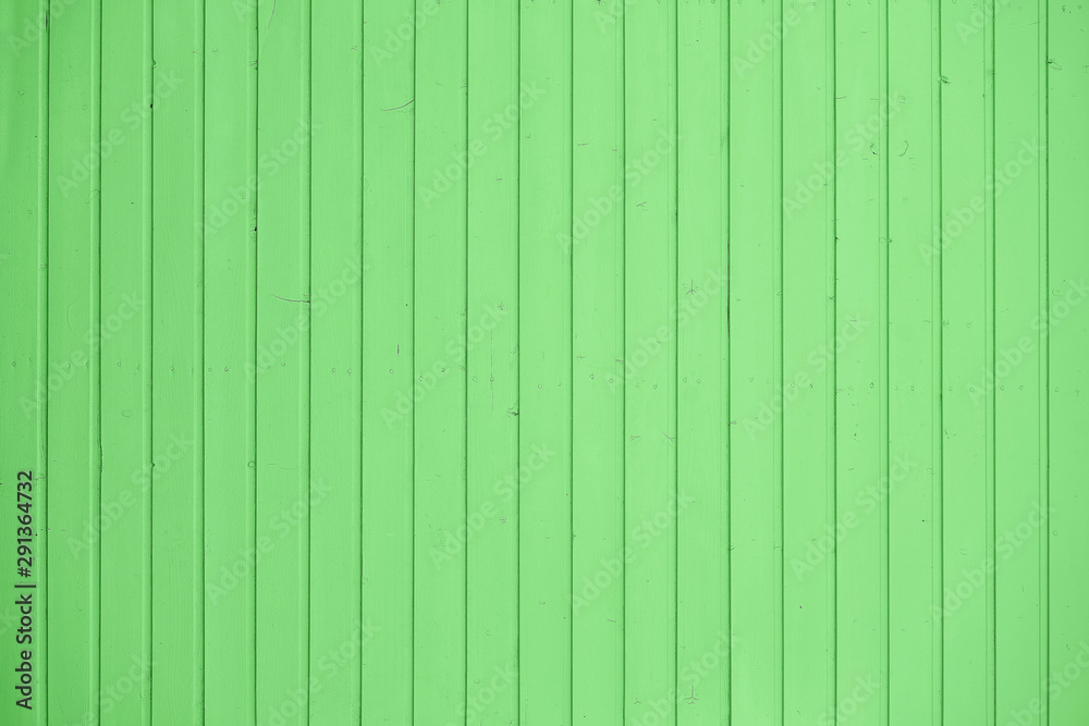 Naklejka premium Natural Wooden Background. Old painted in green boards