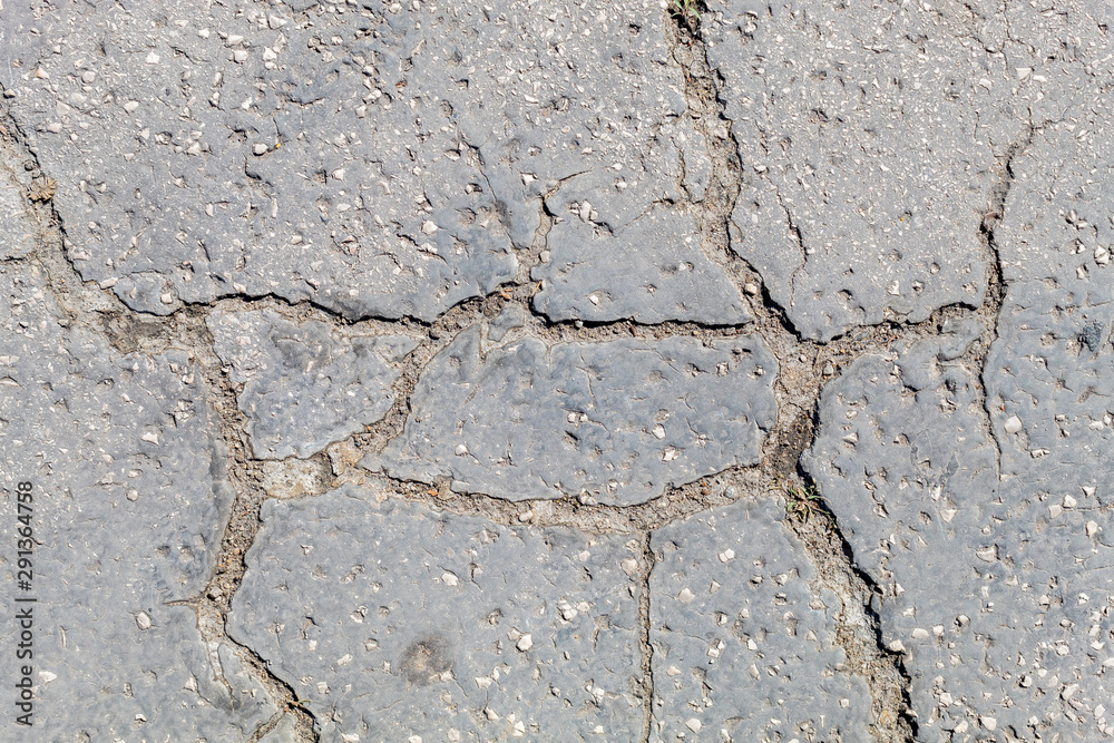 Obraz premium Old Weathered Cracked Asphalt Texture