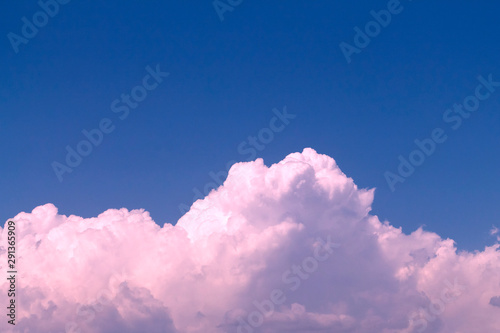 Photography Pink fluffy clouds in blue sky