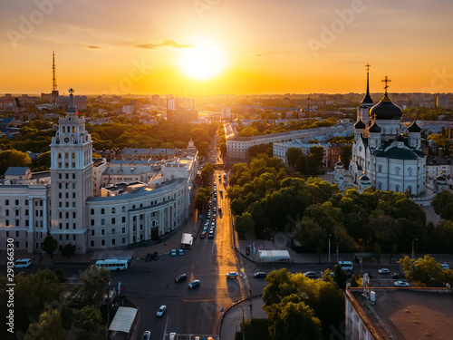 Evening summer Voronezh cityscape. Tower of management of south-east railway and Annunciation Cathedral at sunset