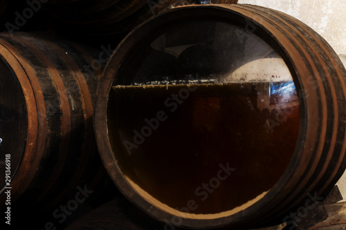 Production of fortified jerez, xeres, sherry wines in old oak barrels in sherry triangle, Jerez la Frontera, El Puerto Santa Maria and Sanlucar Barrameda Andalusia, Spain photo