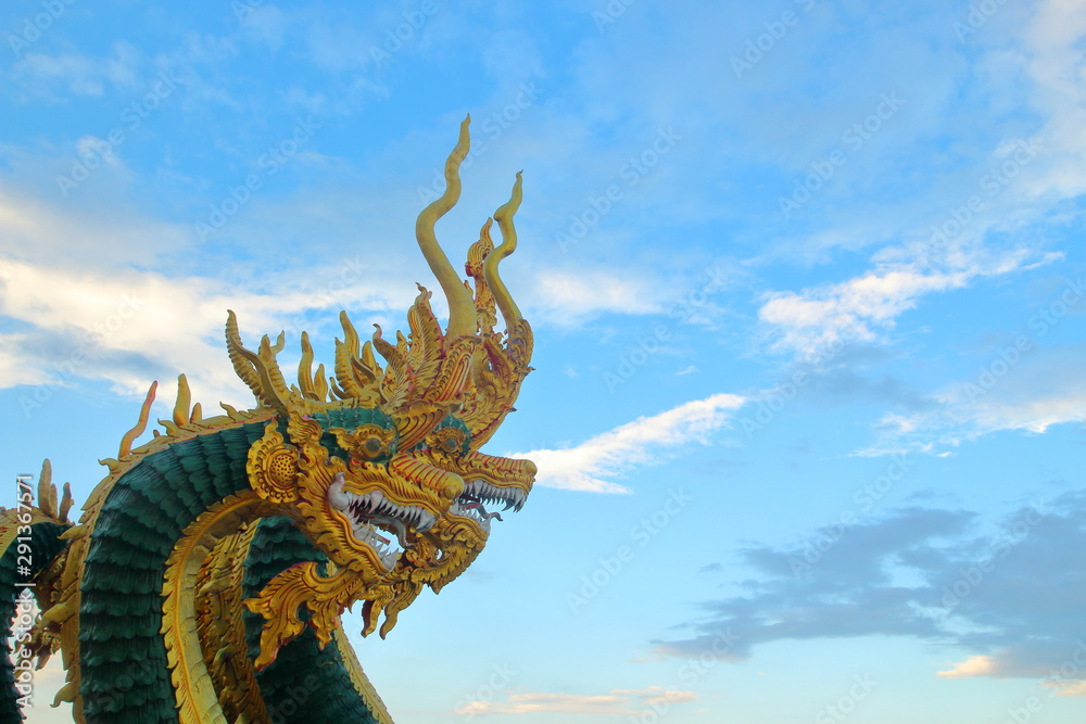 Fototapeta premium golden dragon on blue sky