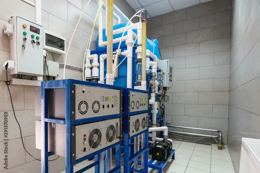 Automated ozone generator for ozonation of pure drinking water in water production factory