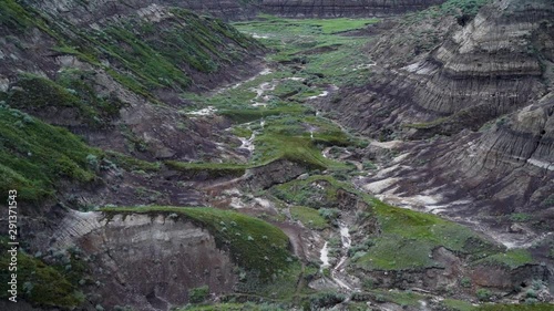 Horsethief Canyon Alberta Canada, tilt up camera movement slowmo photo