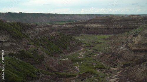 Horsethief Canyon, showing horizontal lines in the canyon walls, panning left to right slowmo photo