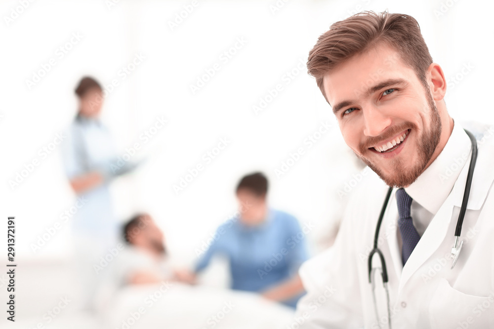closeup.smiling doctor on blurred background. closeup.smiling doctor on blurred background.