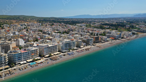 Schilderij op canvas Aerial drone photo of famous seaside area and main town of Loutraki with sandy o