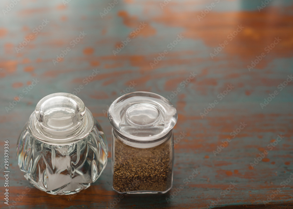 salt and pepper on the wood rustic table 