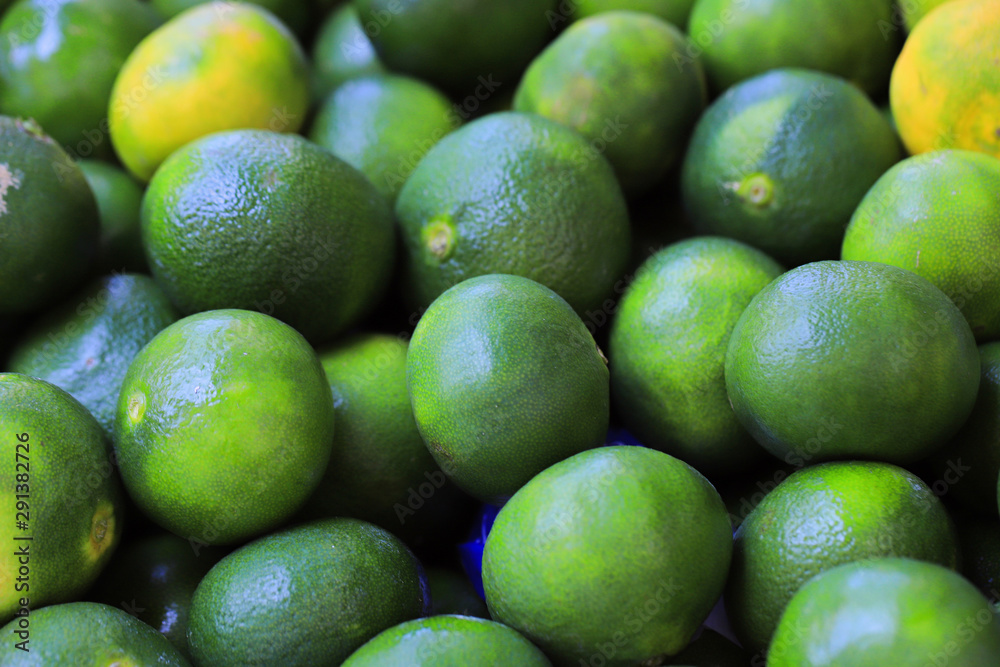 Green limes close up on the market Green limes close up on the market