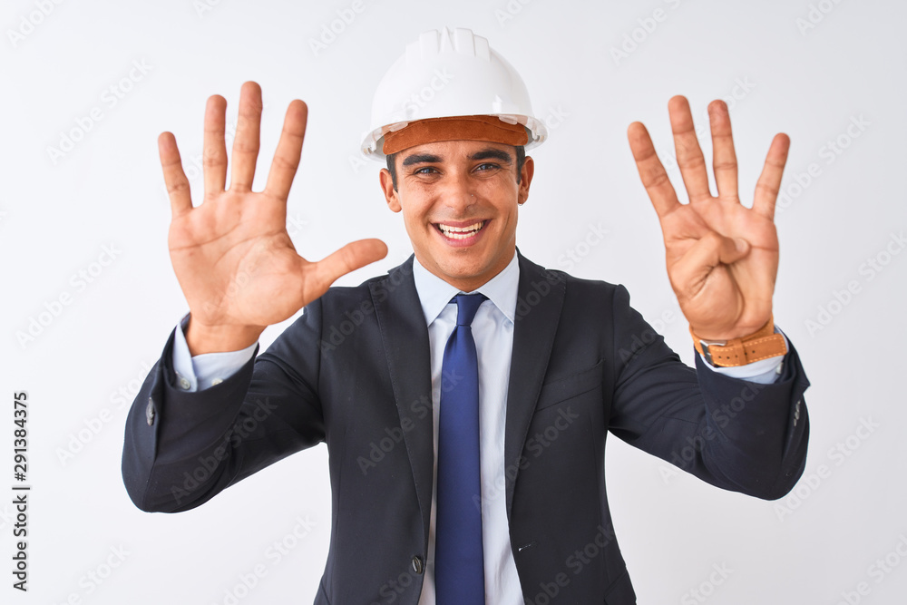 Young handsome architect man wearing suit and helmet over isolated white background showing and pointing up with fingers number nine while smiling confident and happy. Young handsome architect man wearing suit and helmet over isolated white background showing and pointing up with fingers number nine while smiling confident and happy.