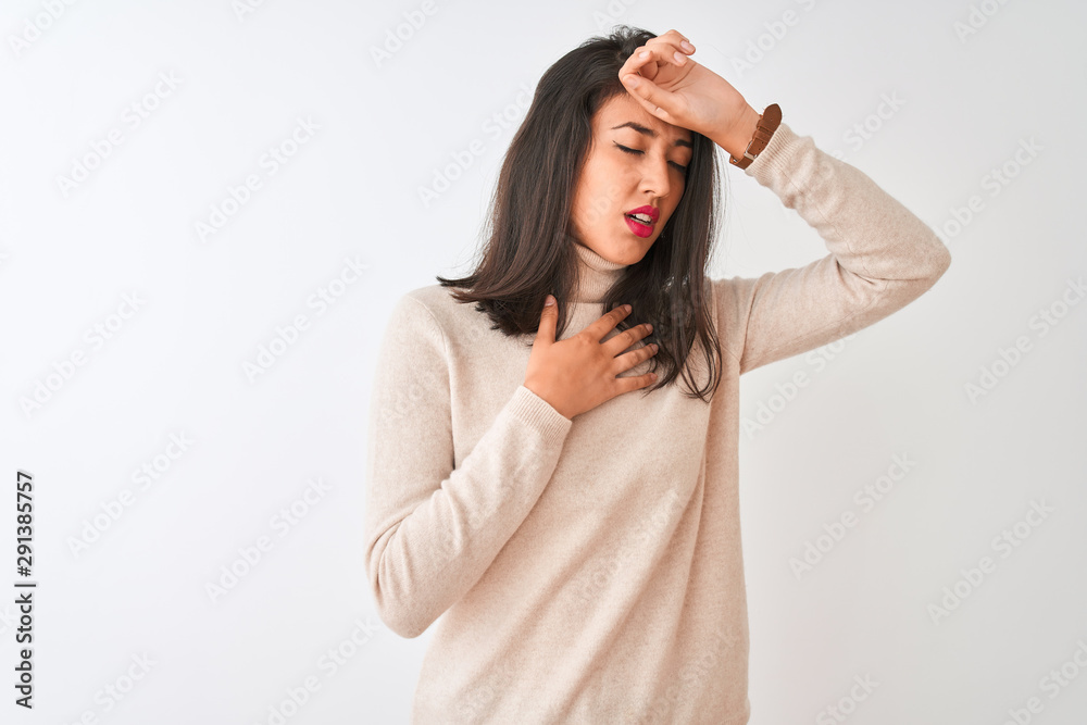 Beautiful chinese woman wearing turtleneck sweater standing over isolated white background Touching forehead for illness and fever, flu and cold, virus sick Beautiful chinese woman wearing turtleneck sweater standing over isolated white background Touching forehead for illness and fever, flu and cold, virus sick